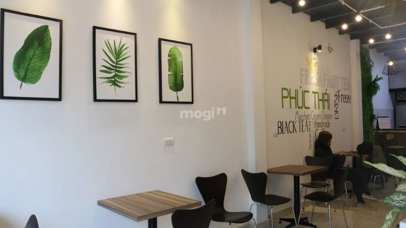 Sử dụng tranh và hình ảnh trang trí tường cho quán cafe