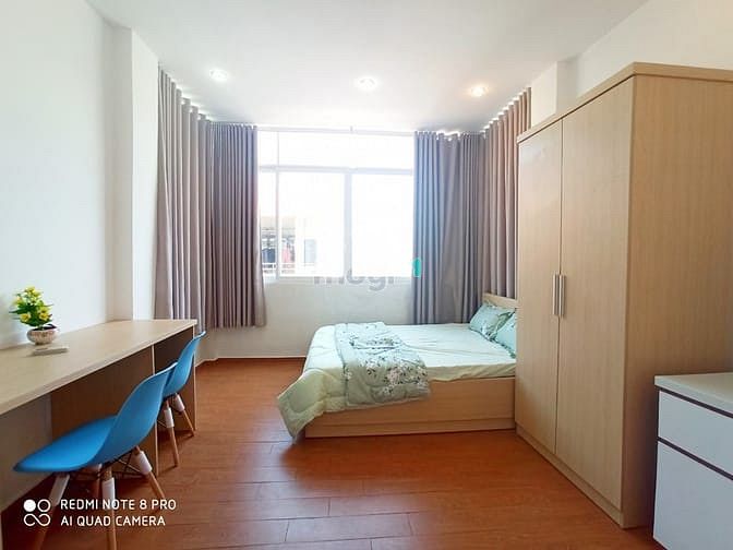 Hình ảnh Khai Trương Căn Hộ Quận 3 - Cửa Sổ Kính Hiện Đại