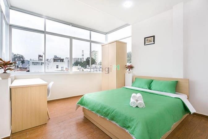 Hình ảnh Khai Trương Căn Hộ Quận 3 - Cửa Sổ Kính Hiện Đại