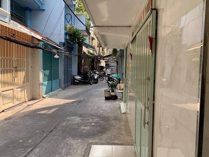Hình ảnh Bán nhà 2 mặt hẻm 4m - Đoàn Văn Bơ, p9,Q4