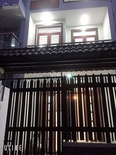 Hình ảnh 1 trệt 2 lầu, hẻm xe hơi thông đường Lê Văn Việt