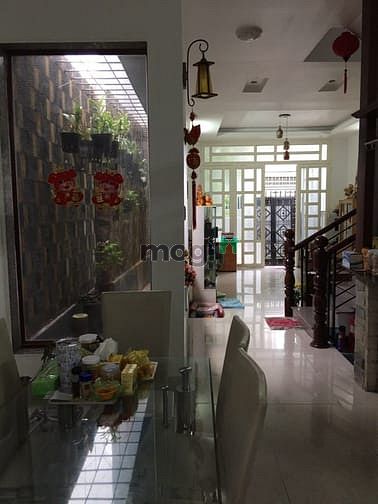 Hình ảnh Bán nhà 92.7m² Tôn Đản F15 Q4