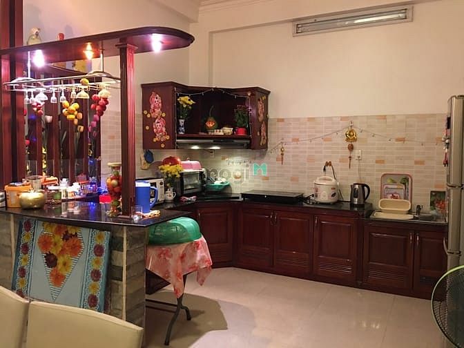 Hình ảnh Bán nhà 92.7m² Tôn Đản F15 Q4