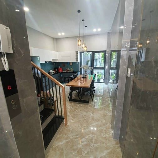 Hình ảnh Bán nhà quận 12, 1 trệt 4 lầu, thang máy, SHR