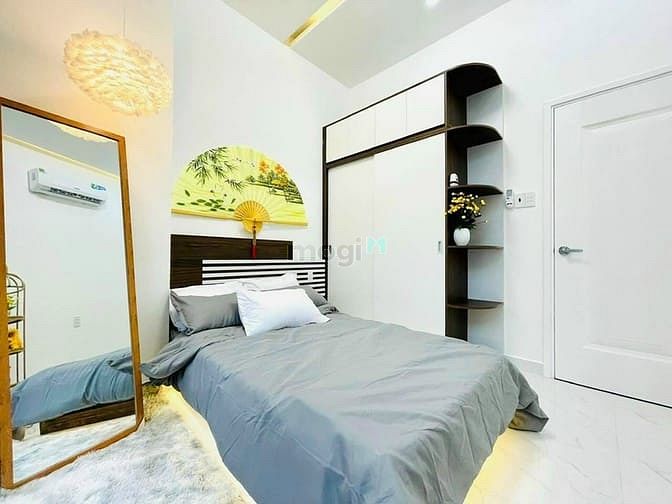 Hình ảnh Bán Gấp nhà 5 tầng , 2 Mặt tiền Phan Văn Trị Q5