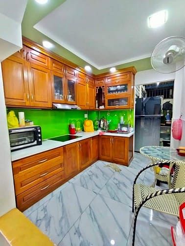 Hình ảnh Bán gấp nhà 4 tầng sát đường Phan văn Trị p11 Bình Thạnh.
