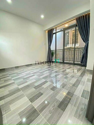 Hình ảnh Căn nhà phố 2 tầng, ngay EMart đường Phan Văn Trị,Q. Bình Thạnh