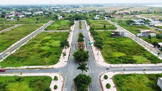 Hình ảnh khu dân cư Phước Đông, KDC nền xanh bao quanh KCN