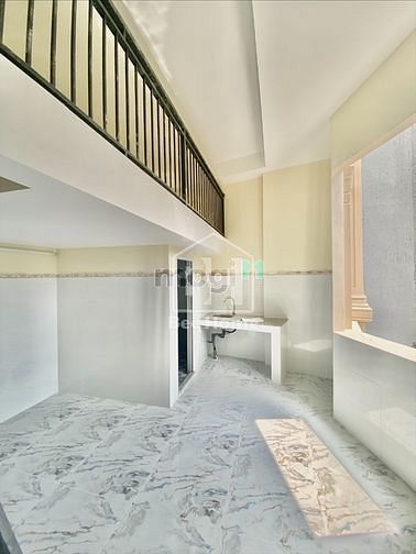 Hình ảnh Duplex máy lạnh cửa sổ mới xây ngay Lê Văn Việt Q.9