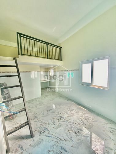 Hình ảnh Duplex máy lạnh cửa sổ mới xây ngay Lê Văn Việt Q.9