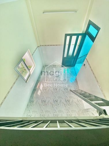 Hình ảnh Duplex máy lạnh cửa sổ mới xây ngay Lê Văn Việt Q.9