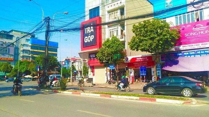 Hình ảnh Mocbai66 - Trang Tải Game Mộc Bài 66 Chính Thức, cửa hàng mặt phố tại khu du lịch Làng Lụa Vạn Phúc