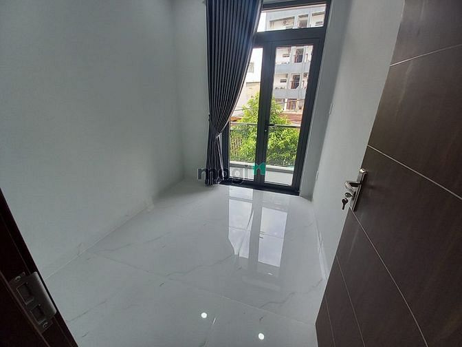 Hình ảnh Gần chợ An Nhơn, hẽm xe hơi, nhà 4 tầng mới đẹp vào ở ngay