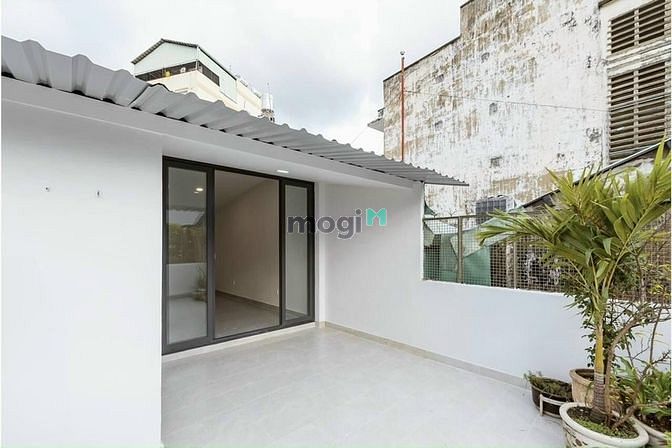 Hình ảnh Nhà nguyên căn full nội thất 1 lầu 2 WC 2 PN quận 3