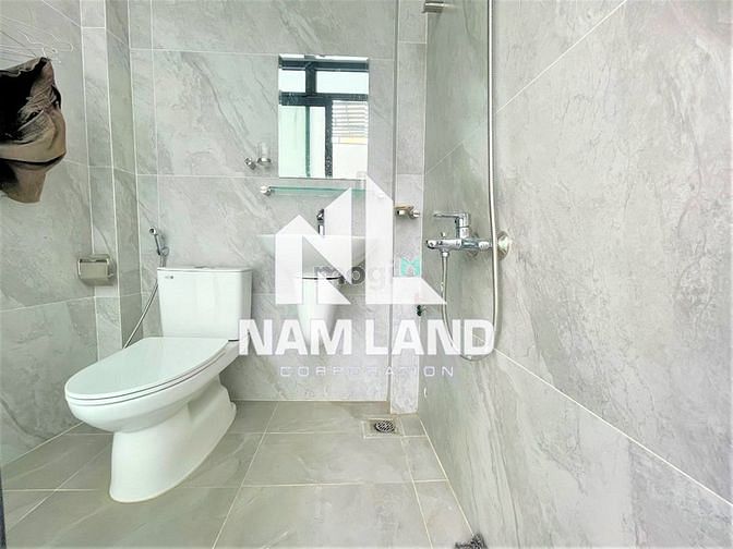 Hình ảnh Cho thuê nhà mới 1 hầm 5 lầu đường số 12 Trần Não