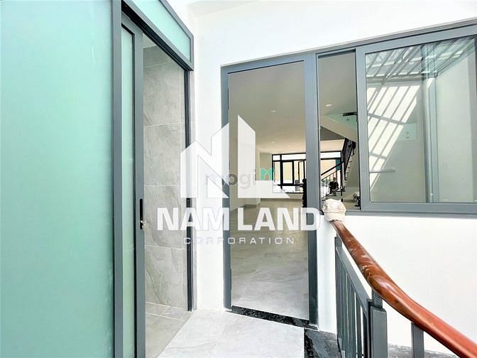 Hình ảnh Cho thuê nhà mới 1 hầm 5 lầu đường số 12 Trần Não