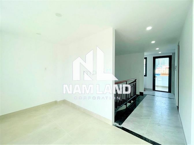 Hình ảnh Cho thuê nhà mới 1 hầm 5 lầu đường số 12 Trần Não