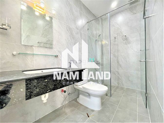 Hình ảnh Cho thuê nhà mới 1 hầm 5 lầu đường số 12 Trần Não