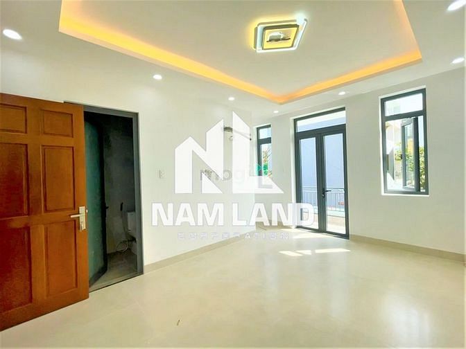 Hình ảnh Cho thuê nhà mới 1 hầm 5 lầu đường số 12 Trần Não