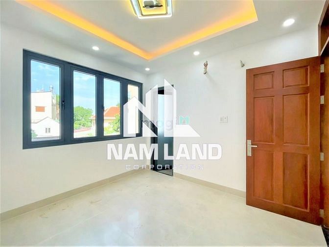 Hình ảnh Cho thuê nhà mới 1 hầm 5 lầu đường số 12 Trần Não