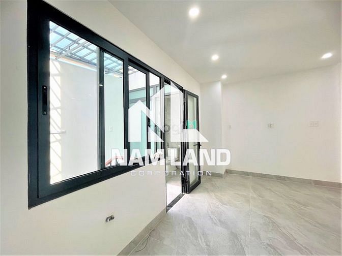 Hình ảnh Cho thuê nhà mới 1 hầm 5 lầu đường số 12 Trần Não