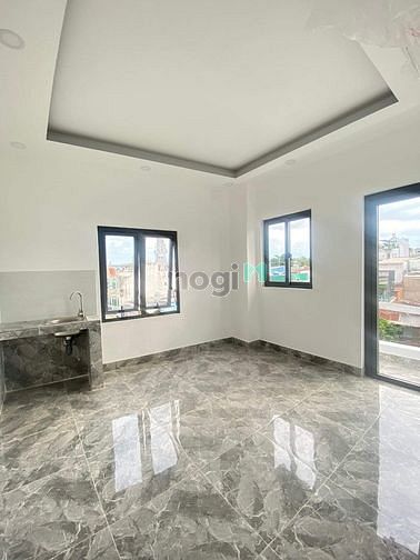 Hình ảnh Phòng studio full nội thất Nơ Trang Long, Ban công, cửa sổ, thang máy