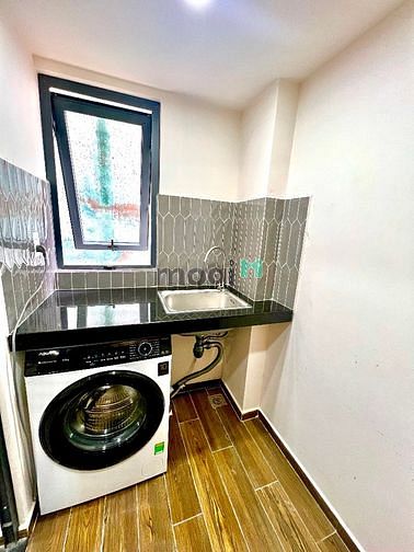 Hình ảnh Bếp tách biệt phòng ngủ, có máy giặt riêng.