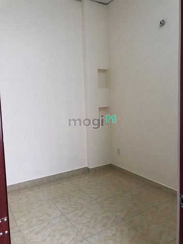 Hình ảnh Cho thuê nhà nguyên căn, nội thất trống, Tôn Đản Quận 4