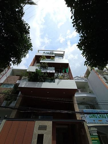 Hình ảnh Nhà mới thiết kế VP đường Bình Giã Tân Bình. Hầm 5 Tầng, thang máy.