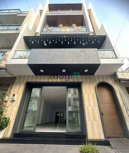 Hình ảnh Nhà 3 tấm MT 7*20 ,có thang máy khu tên lửa