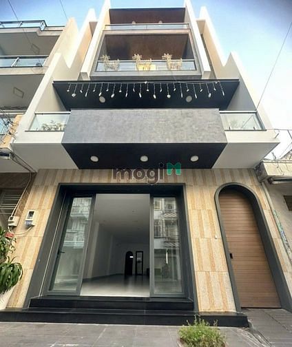 Hình ảnh Nhà 3 tấm MT 7*20 ,có thang máy khu tên lửa