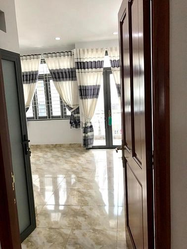 Hình ảnh Mặt Tiền Nơ Trang Long - 7 Tầng - 5 Phòng