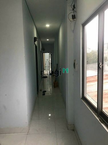 Hình ảnh CHDV 4 tầng, hẻm 6 m, Quận 7. 5*33, 15 phòng. Thu nhập 40 tr.