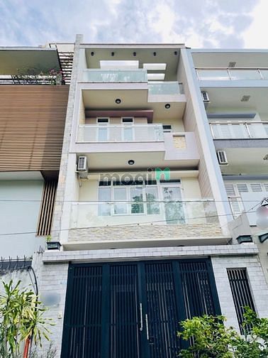 Hình ảnh Cho thuê nhà mới hiện đại hẻm xe hơi quận Tân Bình.