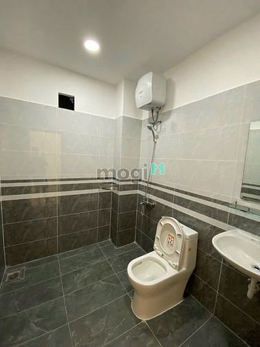 Hình ảnh Cho thuê nhà mới hiện đại hẻm xe hơi quận Tân Bình.