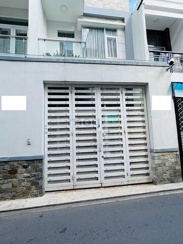 Hình ảnh Cho thuê nhà mới hiện đại 3 phòng ngủ quận Tân Bình.