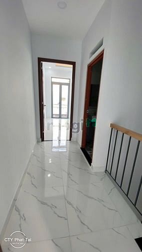 Hình ảnh Nhà Mới Xây Mới Lê Văn Quới đông đúc hẻm xe hơi