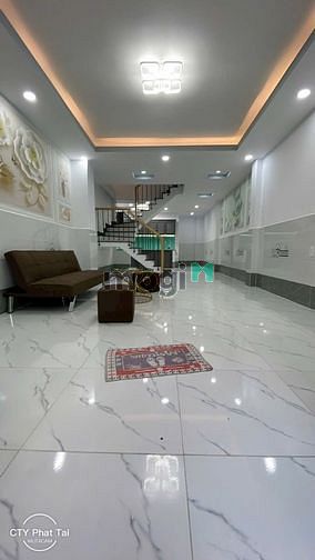 Hình ảnh Nhà Mới Xây Mới Lê Văn Quới đông đúc hẻm xe hơi