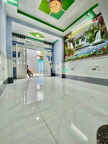 Hình ảnh Chủ cần bán căn nhà 1 trệt 1 lầu gần chợ Hóc Môn gía 1 tỷ 6