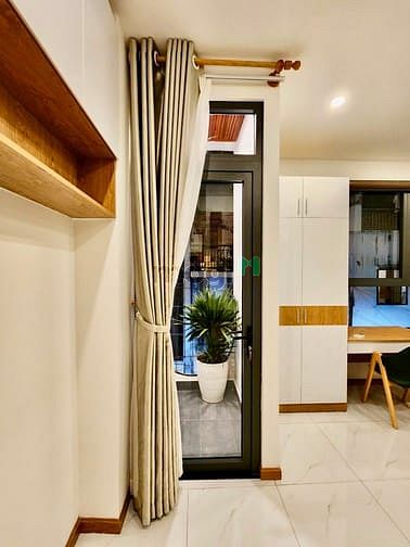 Hình ảnh Trống lại Studio Quận 3 đầy đủ nội thất tiện nghi cửa sổ lớn