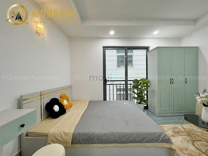 Hình ảnh Mb6623 nạp rút nhanh chóng mới 100% ban công - thang máy - tone xanh gần CV Gia Định