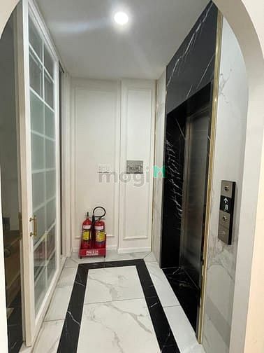 Hình ảnh 100tr giảm còn 70tr. Hầm + 4 lầu. mt Lương Định Của. dt 7x20m. 532m2