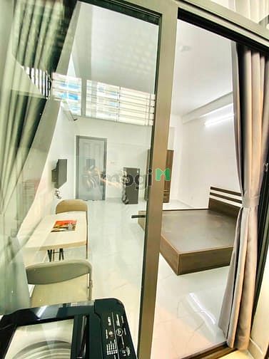Hình ảnh Cho Thuê Studio Tách Bếp Có Máy Giặt Riêng ngay Sân Vận Động Quận 7