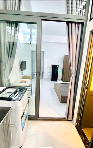 Hình ảnh Cho Thuê Studio Tách Bếp Có Máy Giặt Riêng ngay Sân Vận Động Quận 7