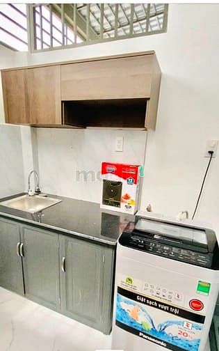 Hình ảnh Cho Thuê Studio Tách Bếp Có Máy Giặt Riêng ngay Sân Vận Động Quận 7