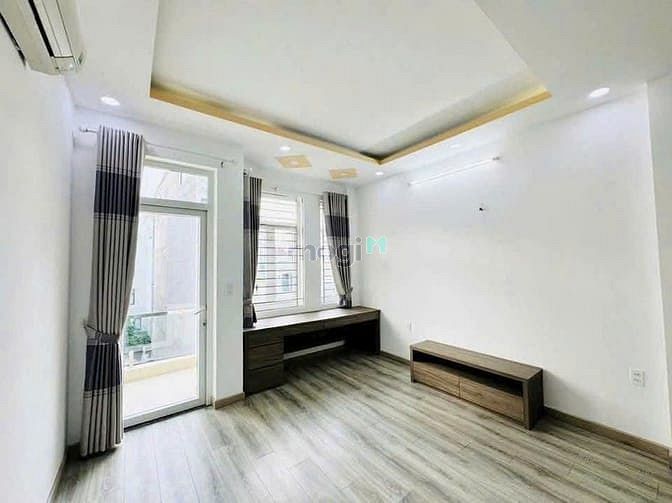 Hình ảnh Cho thuê nhà mới hẻm xe hơi 1017/3A Lạc Long Quân, Quận Tân Bình