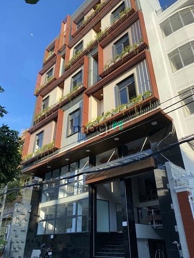 Hình ảnh Bán toà nhà CHDV Quận 7 thu nhập 300 tr/tháng đang Full phòng