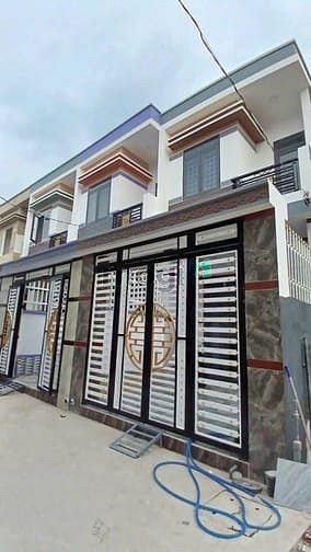 Hình ảnh Nhà 2 tầng mới 100% gần thủ Đức