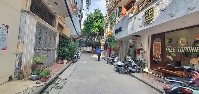 Hình ảnh . Cho thuê 5 tầng riêng biệt Chùa Láng – thang máy, thông sàn, KD sạch