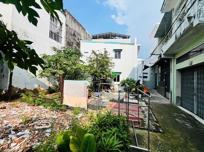 Hình ảnh Quận 7 bán hơn 50m2 đất full thổ cư,hẻm 4m,cao ráo,kdc hiện hữu,3.x tỷ